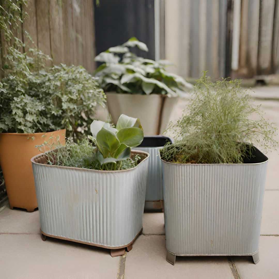 Contribución al reciclaje con jardineras metálicas